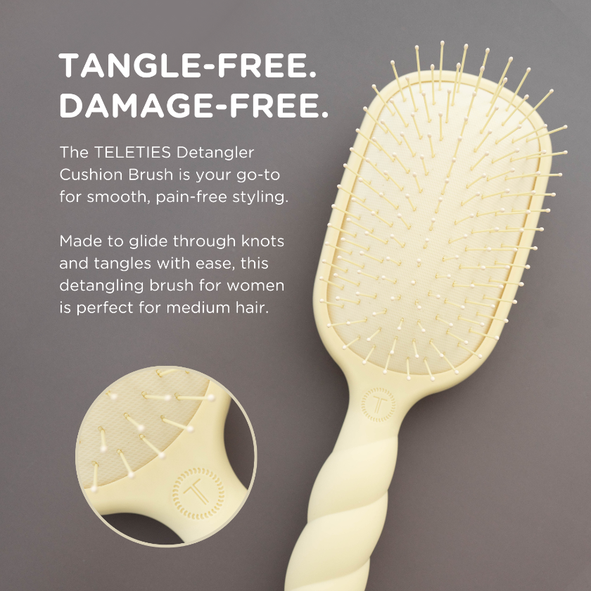 Teleties Detangler Cushion Brush with text on a gray background