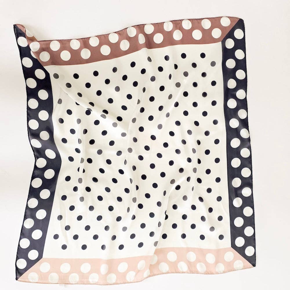 Square scarf with polka dot pattern on a white background
