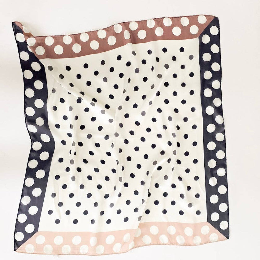 Square scarf with polka dot pattern on a white background
