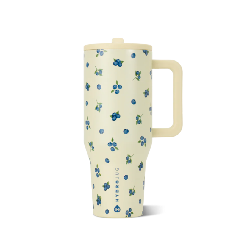 Cream-colored travel mug with blueberry pattern on a white background