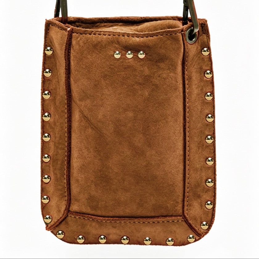 Brown leather pouch with gold studs and a strap on a white background