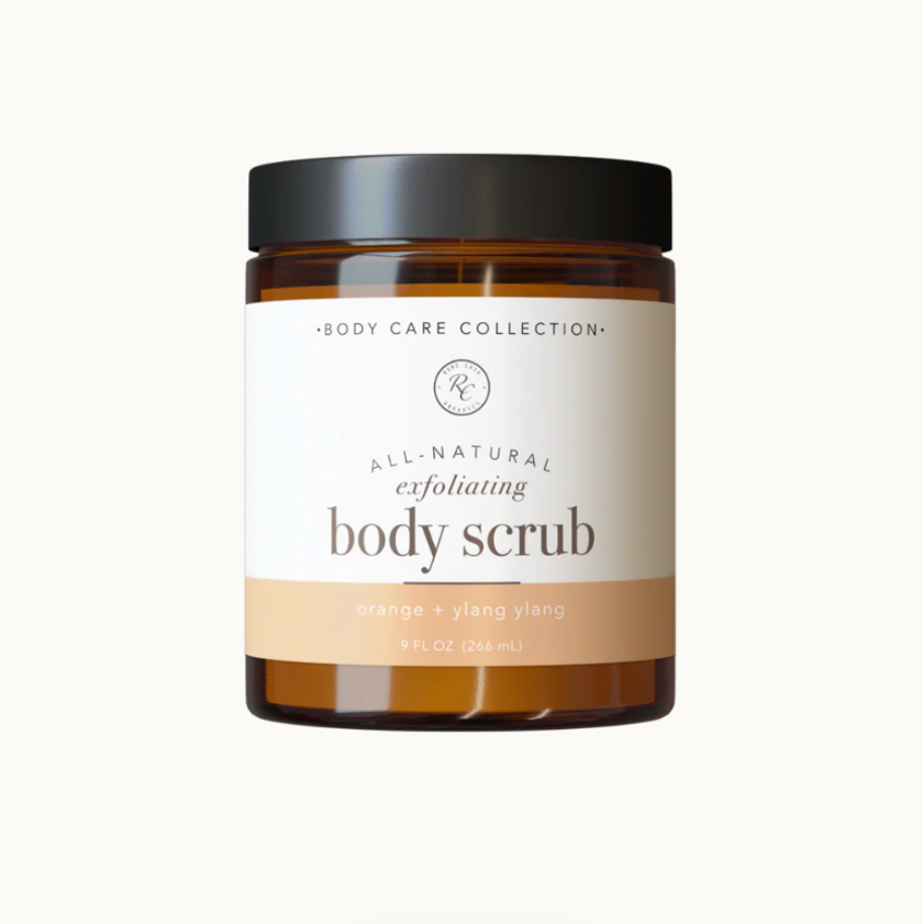 Jar of all-natural exfoliating body scrub with a white label on a light gray background