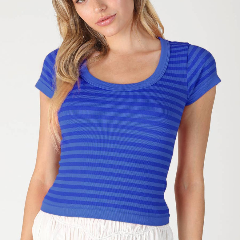 Woman wearing a blue striped shirt on a white background