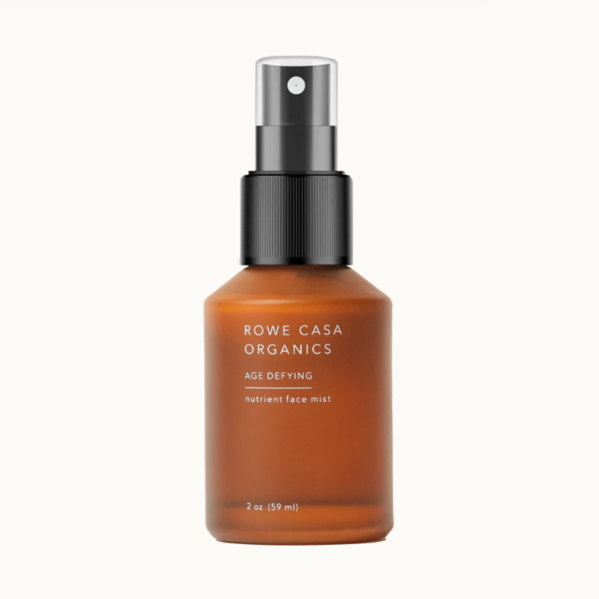 Brown spray bottle with black nozzle labeled 'Rowe Casa Organics' on a white background