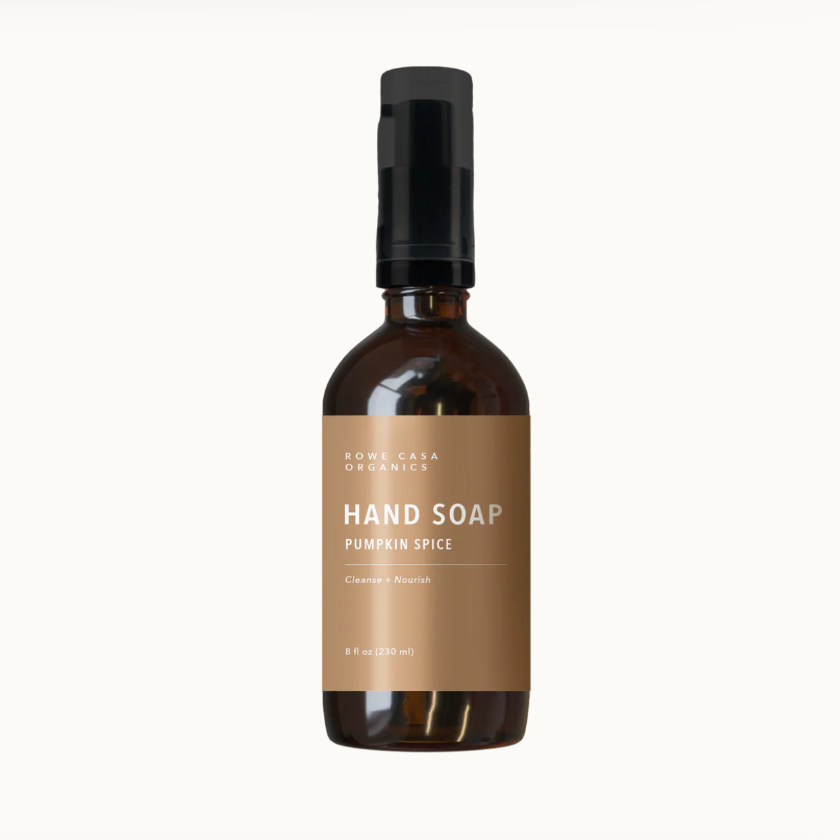 Hand soap bottle with pump labeled 'Pumpkin Spice' on a white background