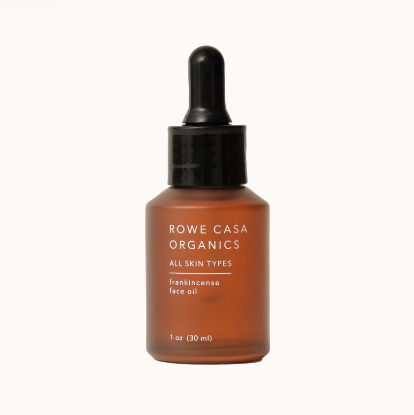 Brown bottle with black dropper labeled 'Rowe Casa Organics' on a white background