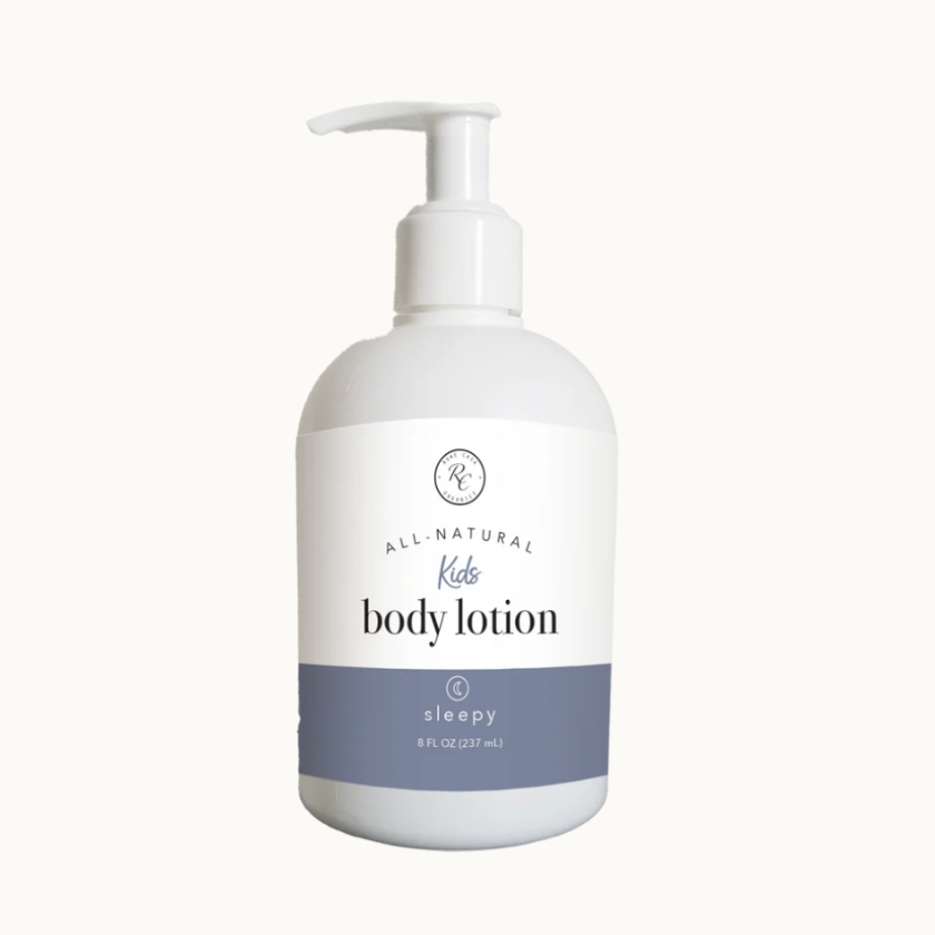 All natural body lotion bottle with pump on a white background