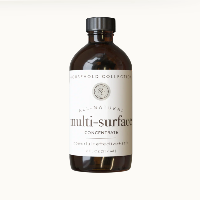 Bottle of all-natural multi-surface concentrate on a white background