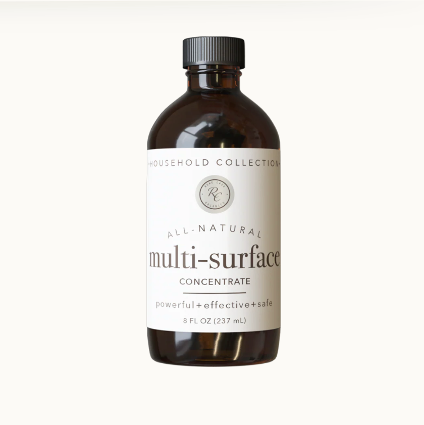 Bottle of all-natural multi-surface concentrate on a white background