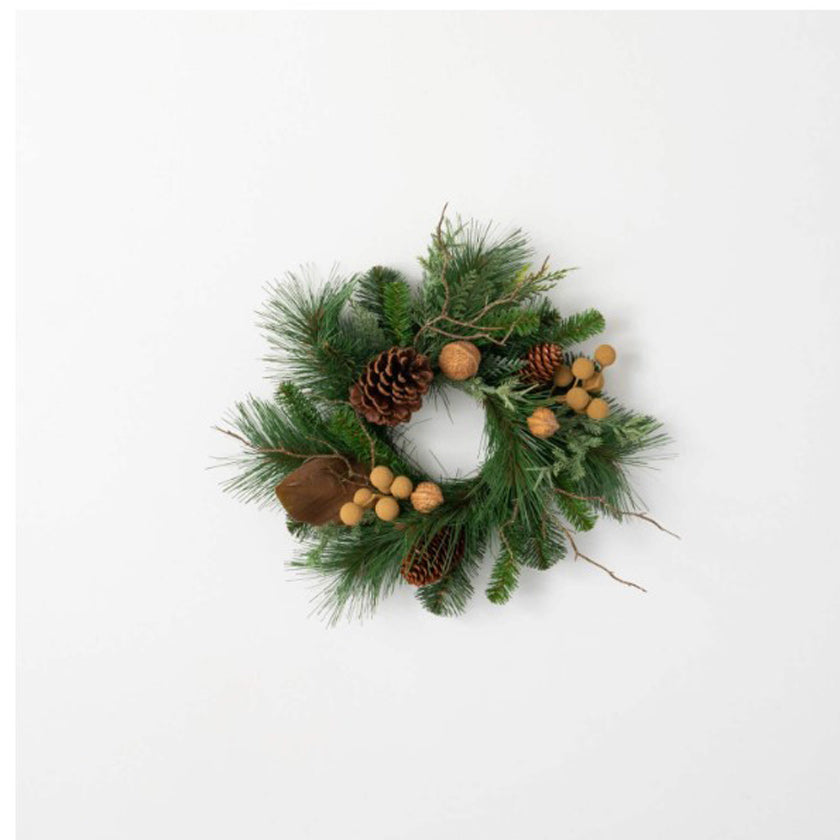 Natural faux pine is delightfully accented with a scattering of cones & nuts to create a look that is truly unique.