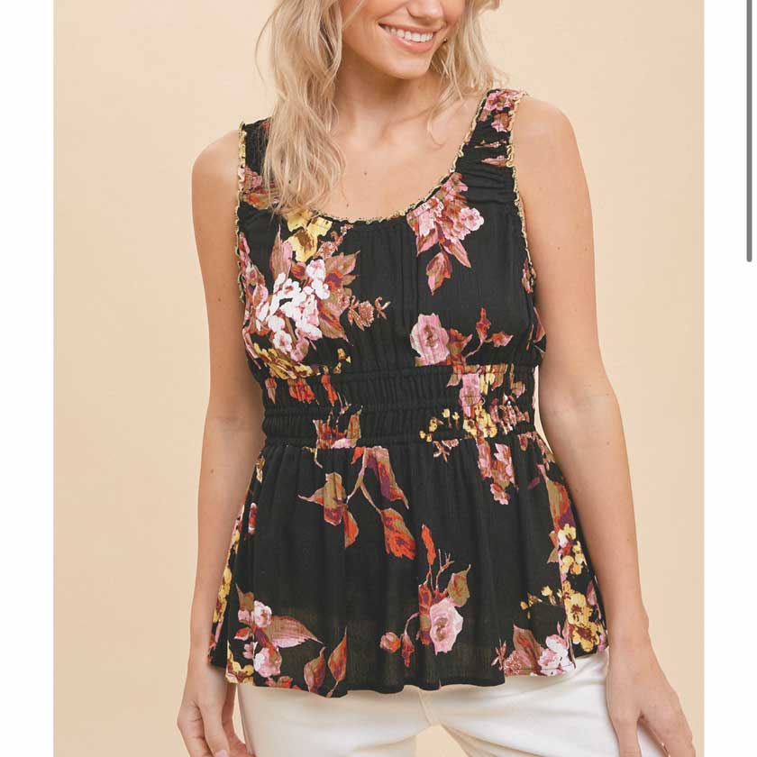 FLORAL PRINTED SLEEVELESS SHIRRING NECK PEPLUM BLOUSE IN BLACK